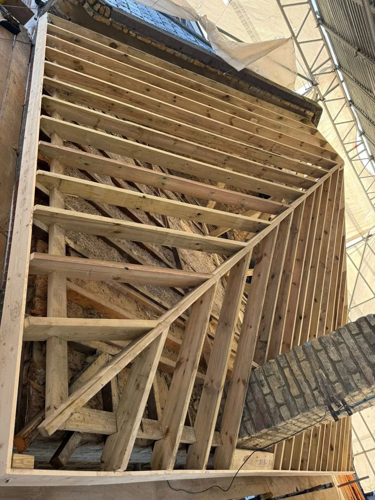 New roof timbers and rafters during a re-roof in Mevagissey